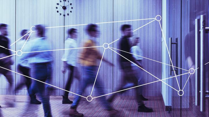 Employees walking in an AI-powered workplace with InenrSpace Data 